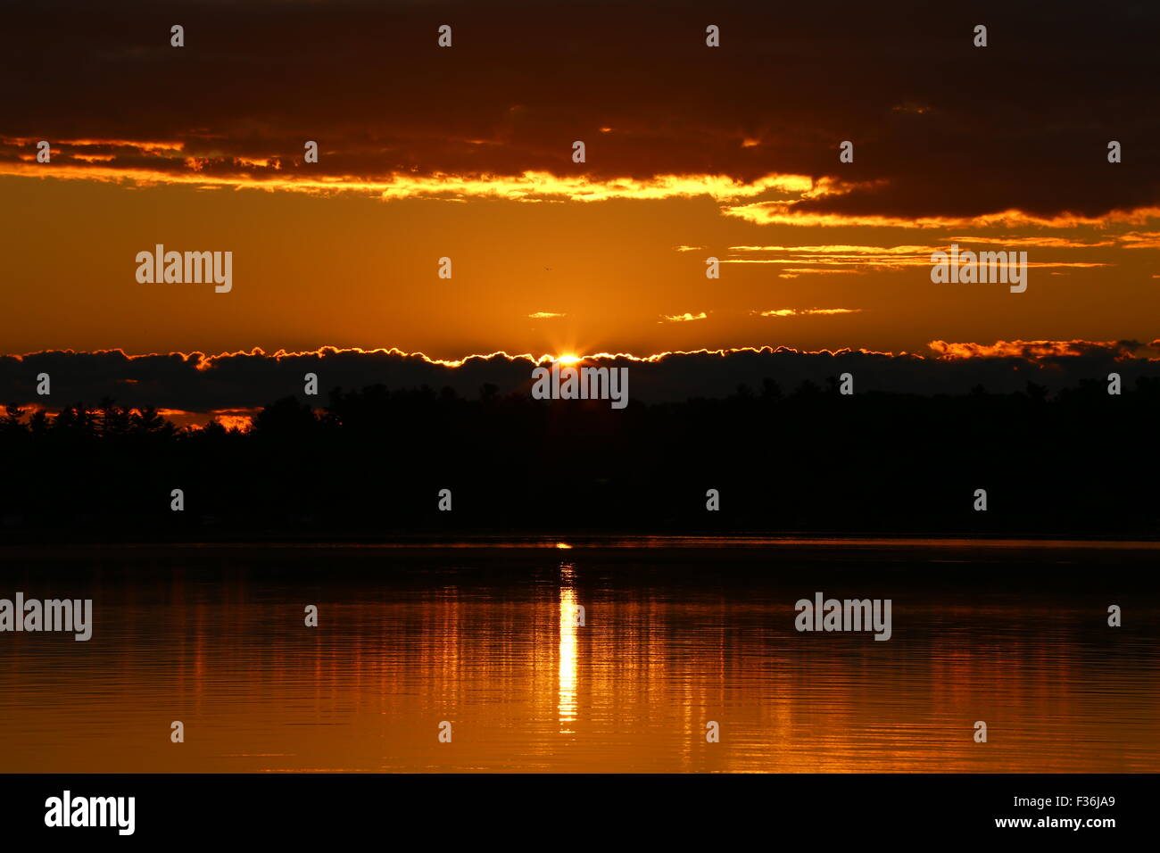 Ecco che arriva il sole Foto Stock