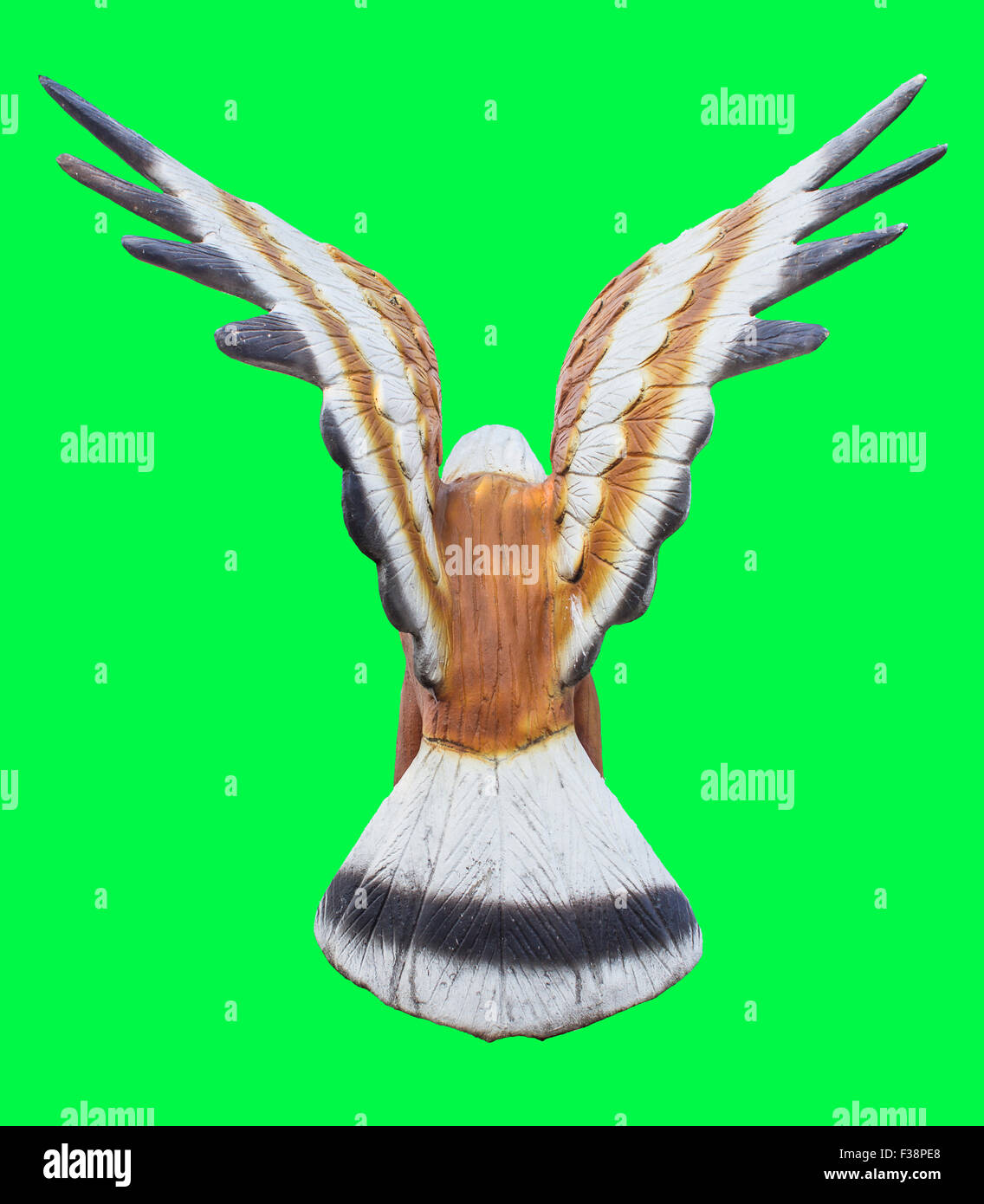 Girare indietro Eagle o Falcon statueIsolated su schermo verde chroma key sfondo. Foto Stock