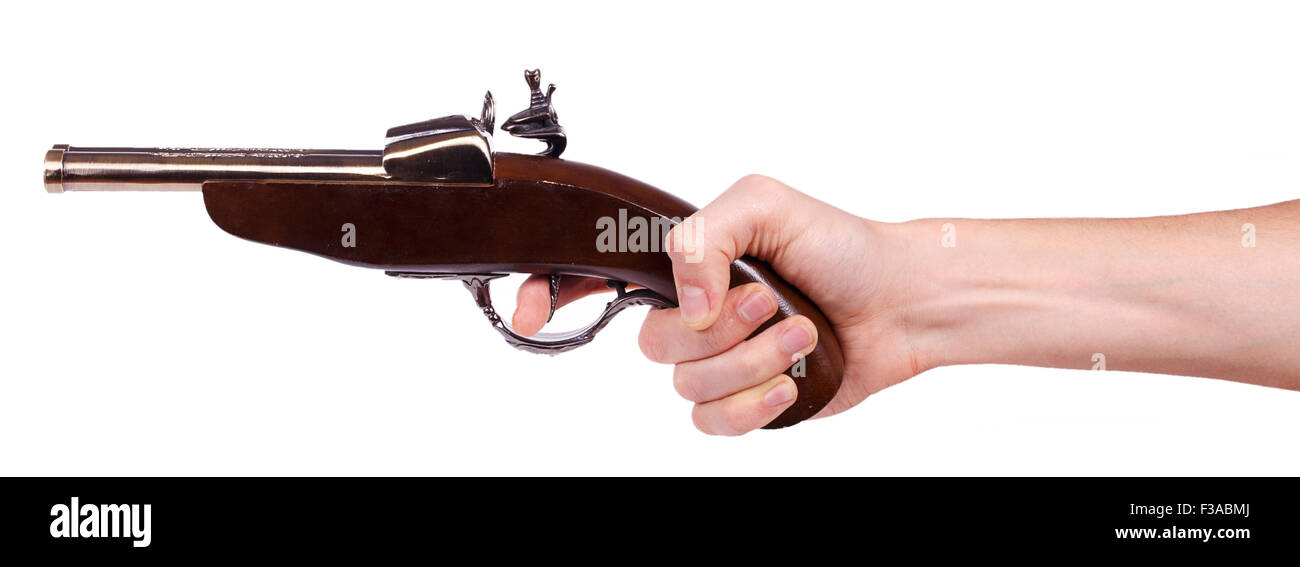 Il vecchio moschetto pistola in mano maschio isolato su sfondo bianco Foto Stock