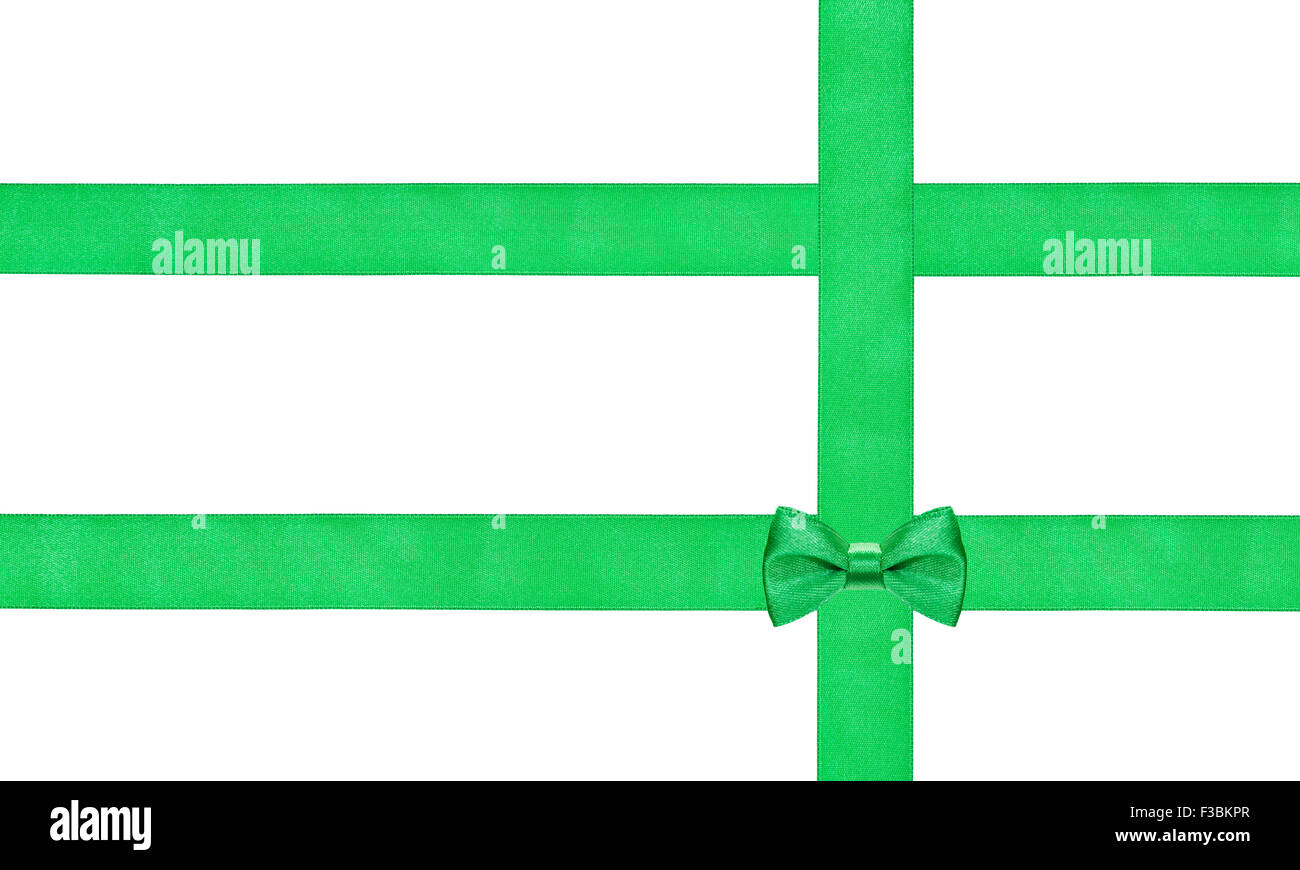 Un po' di verde nodo di prua su tre nastri di raso isolati su sfondo bianco Foto Stock