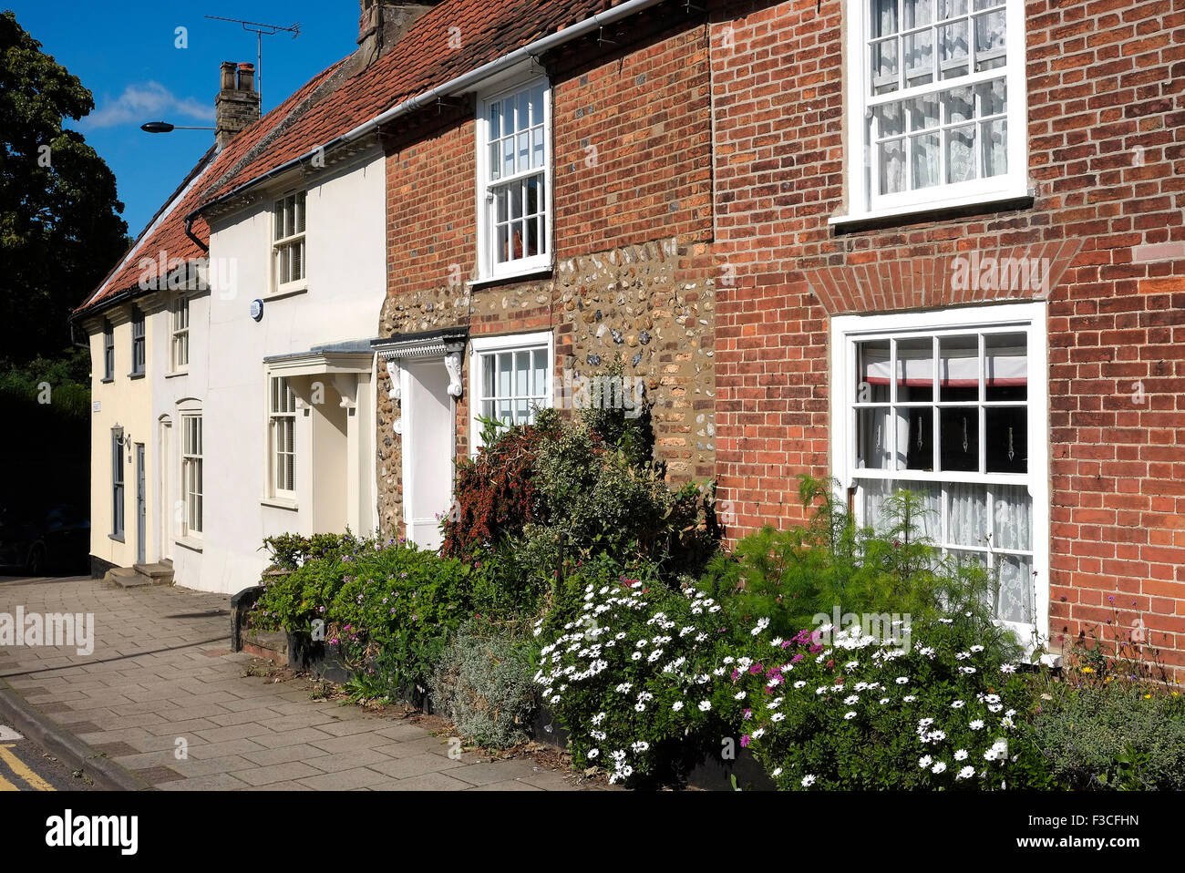 Fila di vecchie case in stile georgiano, HOLT, North Norfolk, Inghilterra Foto Stock