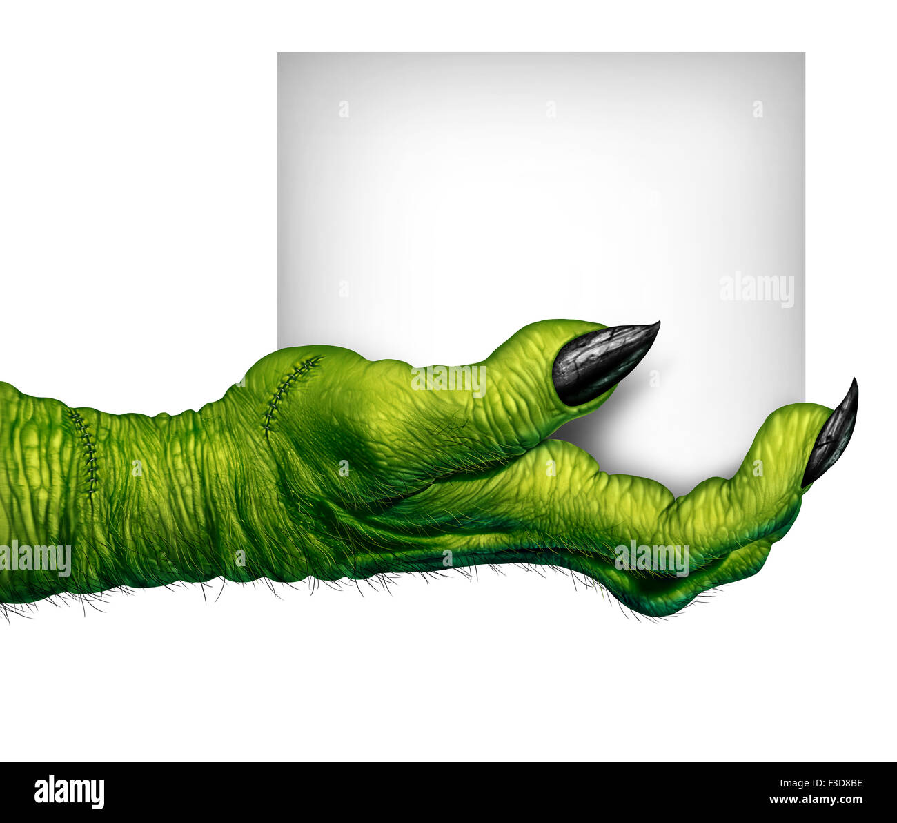Monster mano che tiene un cartello come dita di zombie con la scheda vuota come creepy halloween o scary simbolo con texture della pelle verde stropicciata scary dita e punti isolati su sfondo bianco Foto Stock