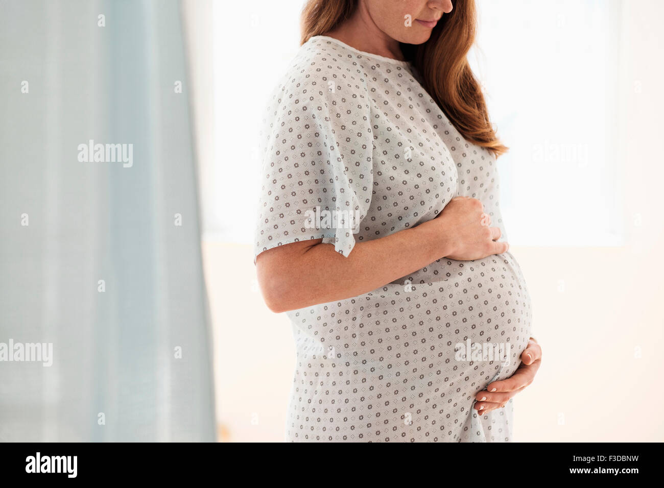Donna incinta all'ospedale Foto Stock