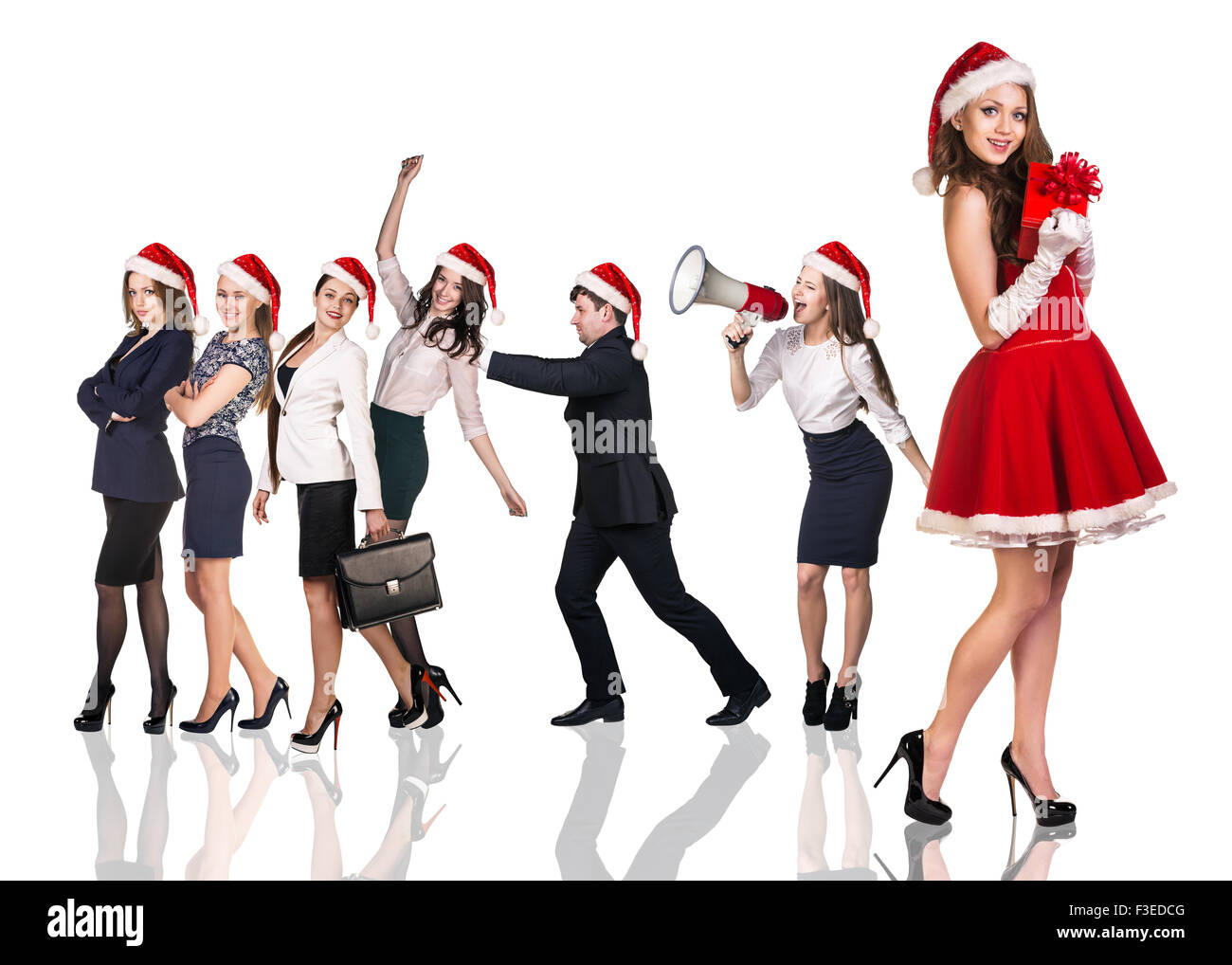 La donna a Santa Claus costume con la gente di affari Foto Stock