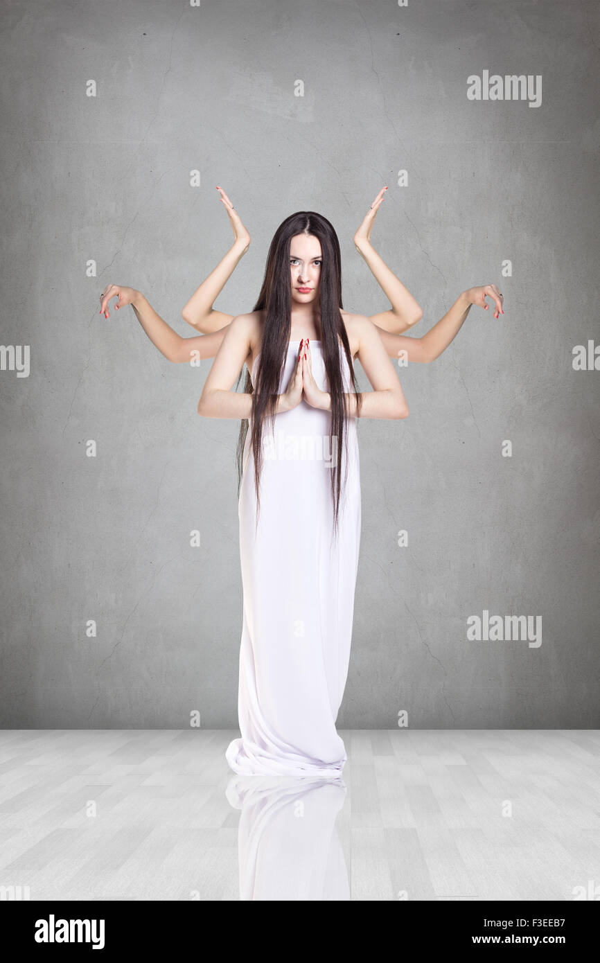 Bella donna con molte mani Foto Stock