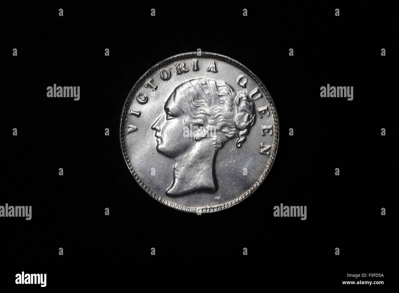 Monetazione ; India britannica monetazione ; regina Victoria sulla moneta Foto Stock