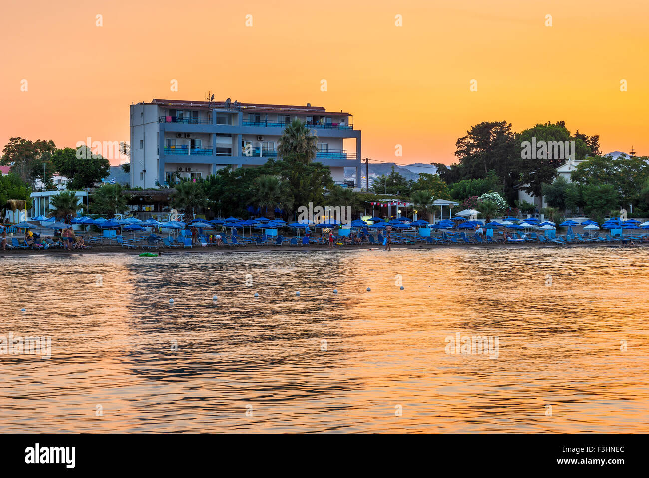 Tramonto sulla costa di Faliraki RODI, DODECANNESO Grecia Europa Foto Stock