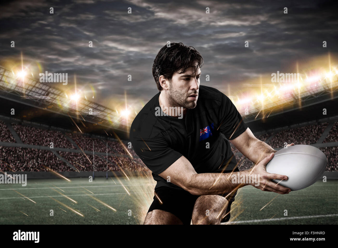 Nuovo Zealander giocatore di rugby, indossando un bianco unifrme in uno stadio. Foto Stock