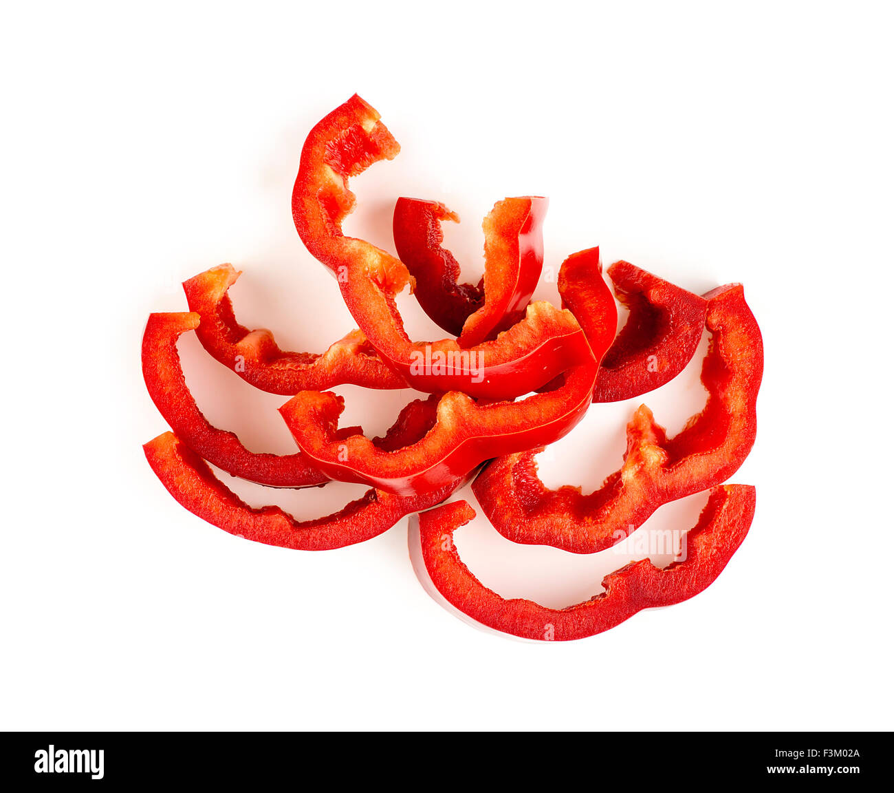 Succosa peperone rosso tagliati e isolato su bianco Foto Stock