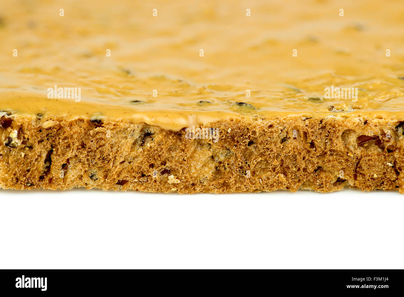Macro closeup del bordo del burro di arachidi toast Foto Stock Macro closeup del bordo del burro di arachidi toast Foto Stock