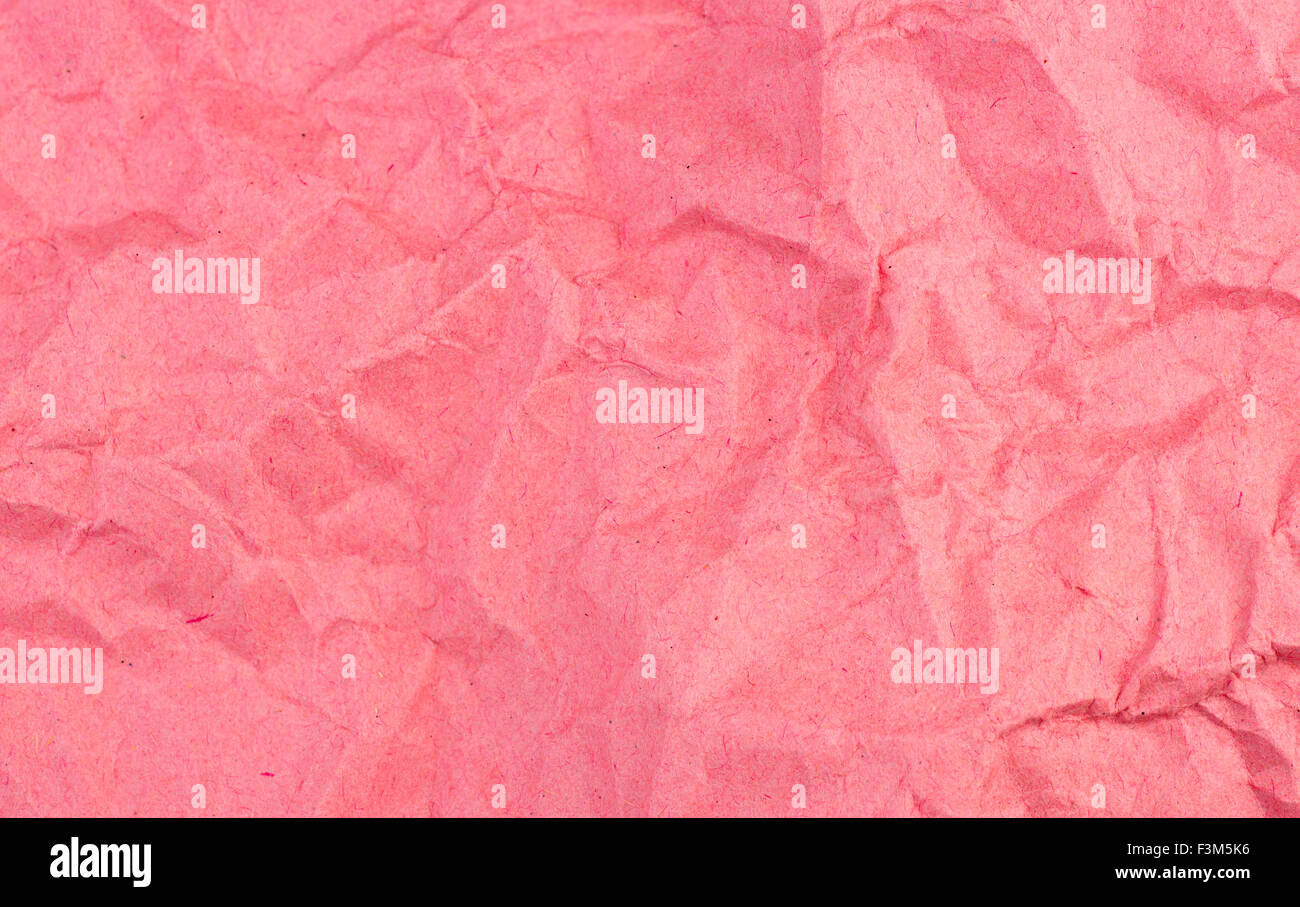 Angosciata e weathered carta rossa texture di sfondo Foto Stock