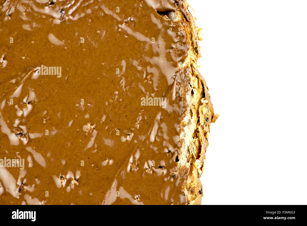 Macro Closeup di cioccolato nocciola spalmata sul pane Foto Stock Macro Closeup di cioccolato nocciola spalmata sul pane Foto Stock
