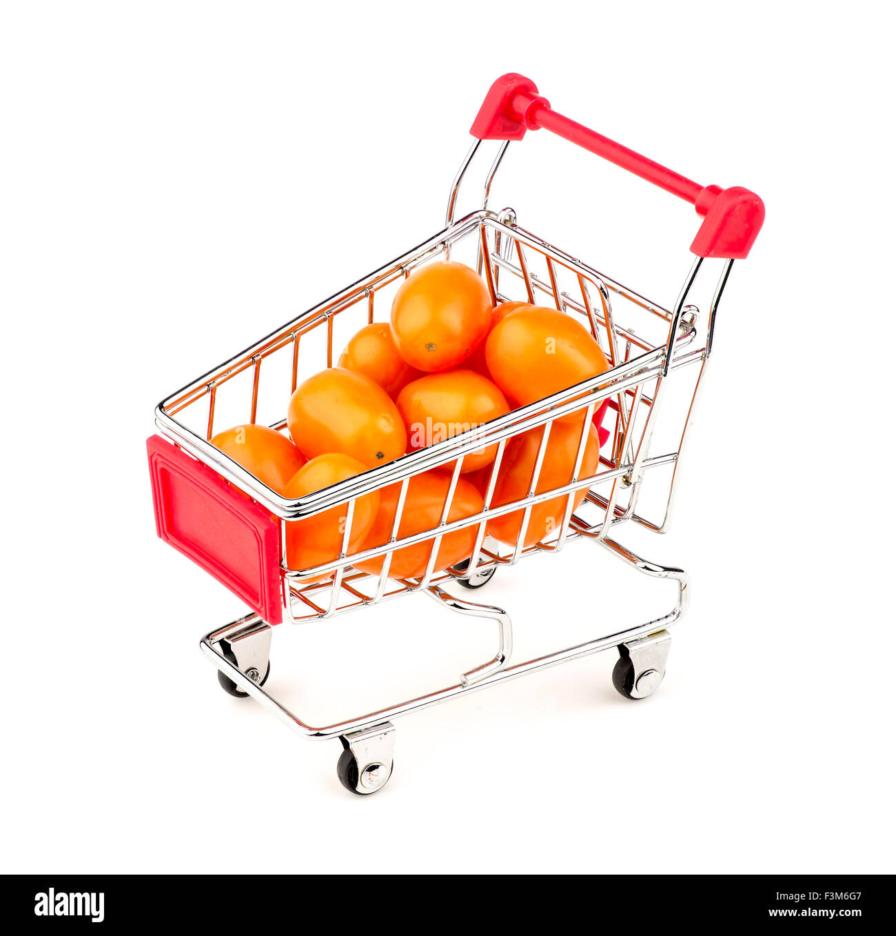 Orange uva d'oro i pomodori in mini carrello Foto Stock