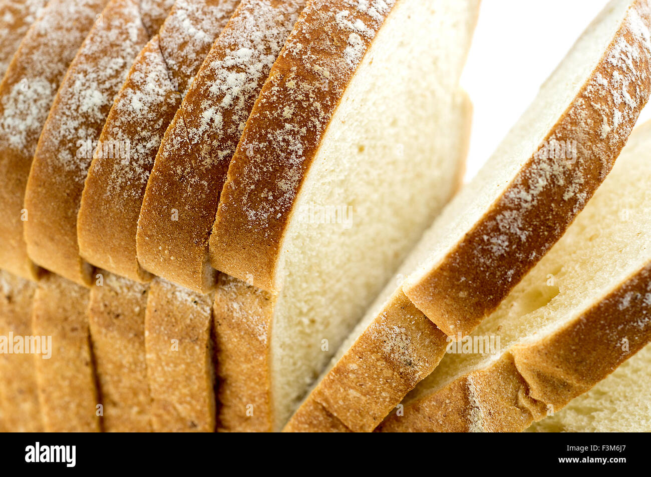 Macro Closeup della pagnotta di pane con fette Foto Stock Macro Closeup della pagnotta di pane con fette Foto Stock