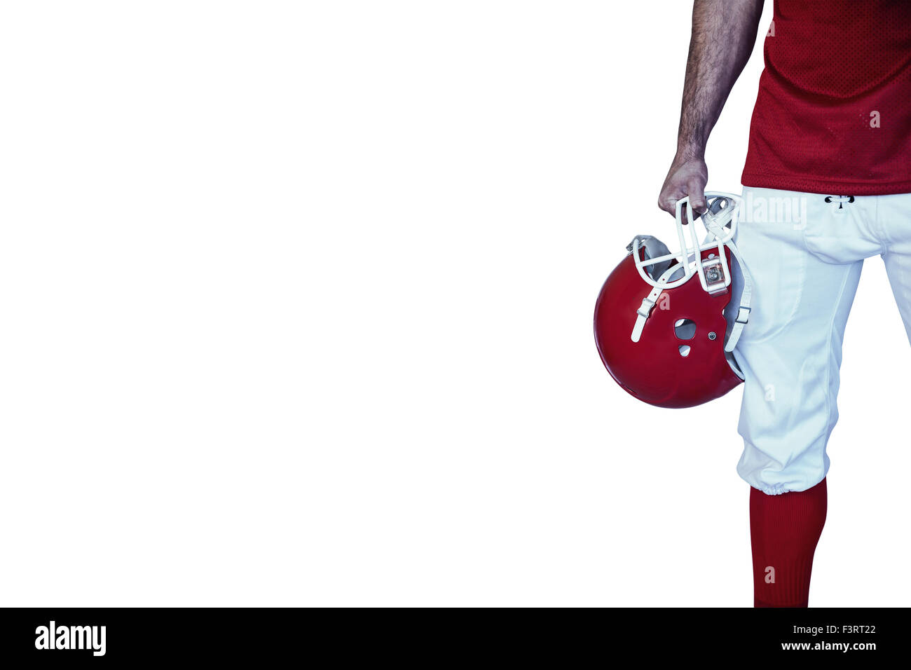 Sezione mediana di un giocatore di rugby holding casco Foto Stock