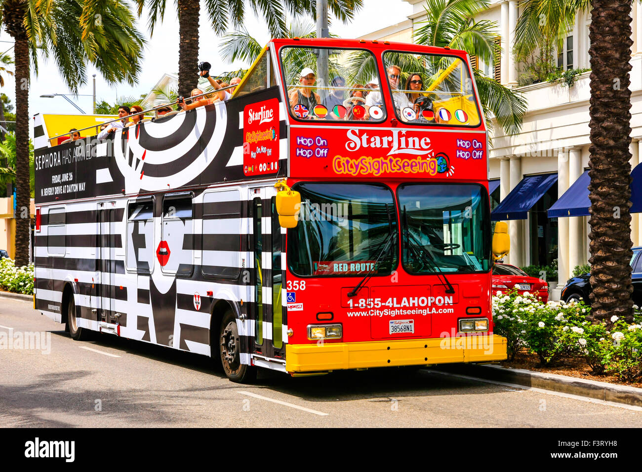 Mondo conosciuto Hop on Hop Off City sightseeing bus su Rodeo Drive a Beverly Hills California Foto Stock