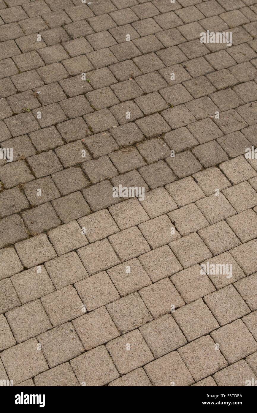 Pavimento esterno la pulizia con getto di acqua ad alta pressione Foto Stock