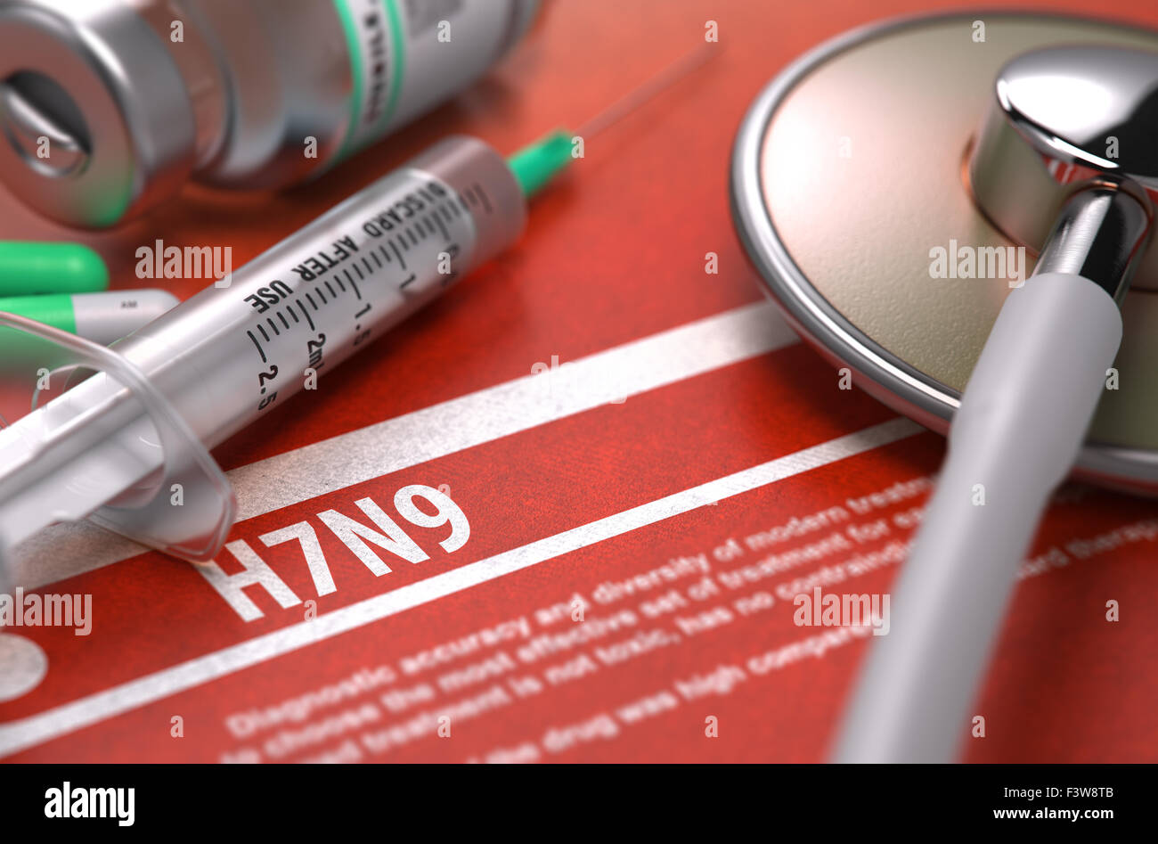 H7N9 virus su sfondo arancione e composizione medica - stetoscopio, pillole e la siringa. Concetto medico. Immagine sfocata. Foto Stock
