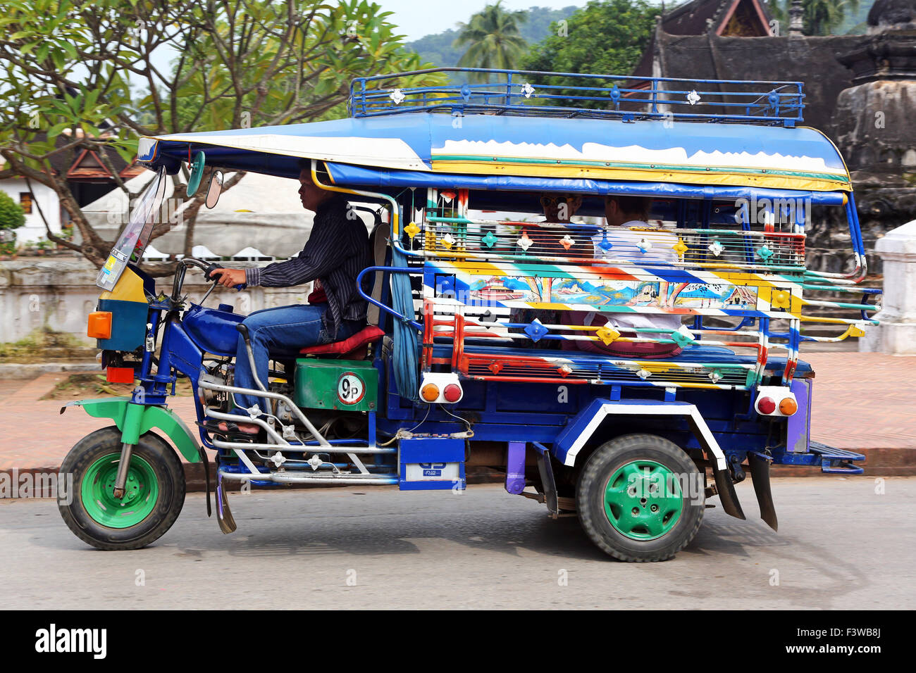 A tre ruote Tuk Tuk taxi a Luang Prabang, Laos Foto Stock