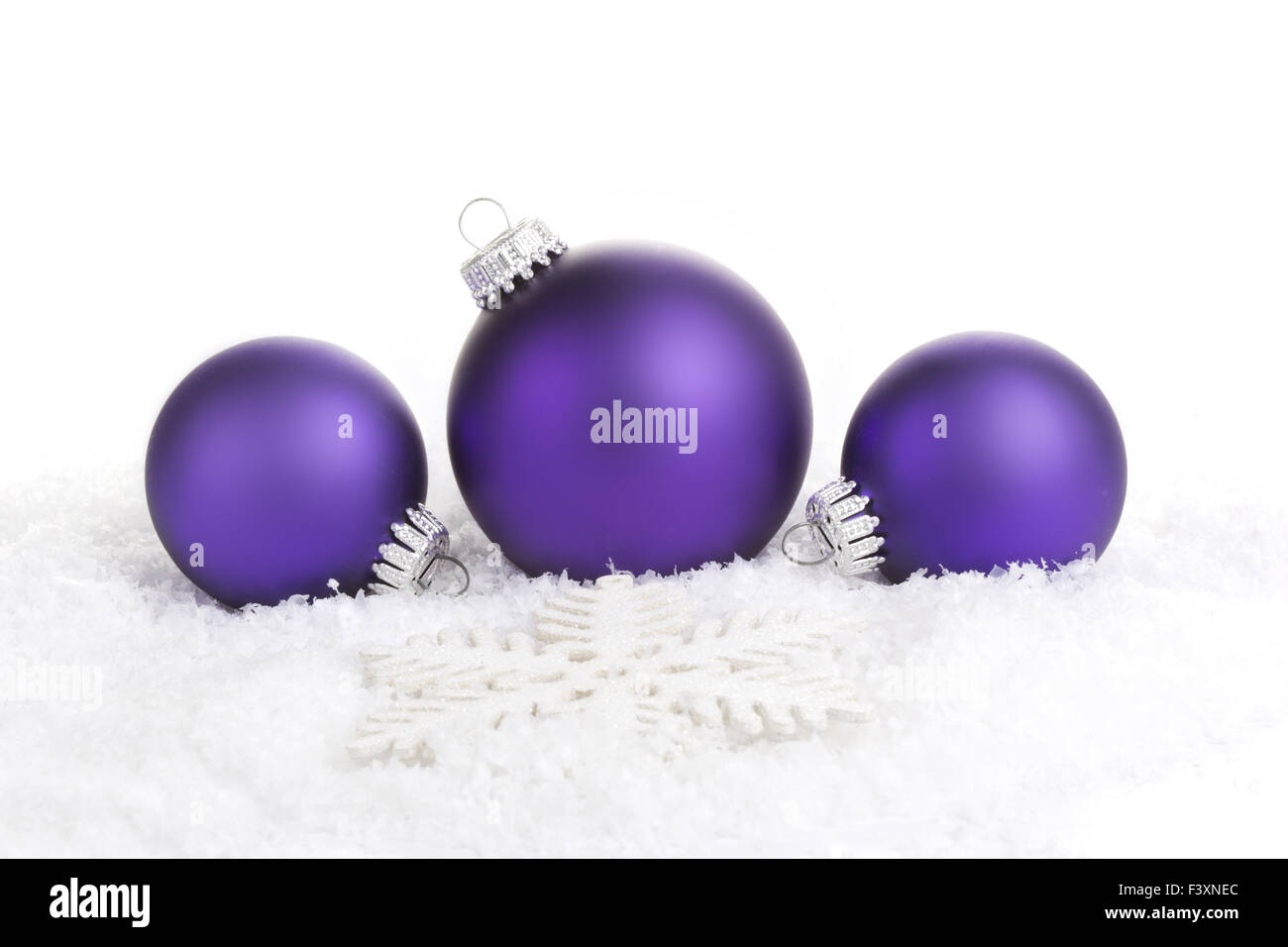 Le palle di Natale viola con stella Foto Stock