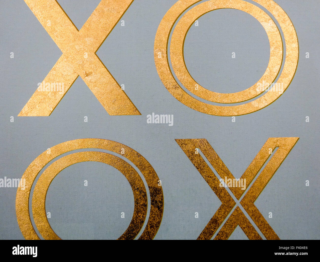 Golden xoxo lettere su cartone telato Foto Stock