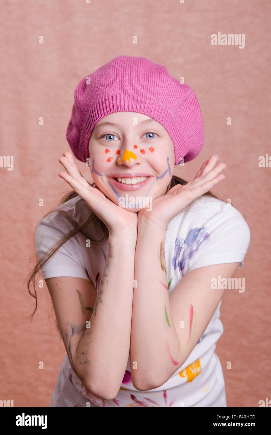 Ritratto di una ragazza coperto di vernice Foto Stock