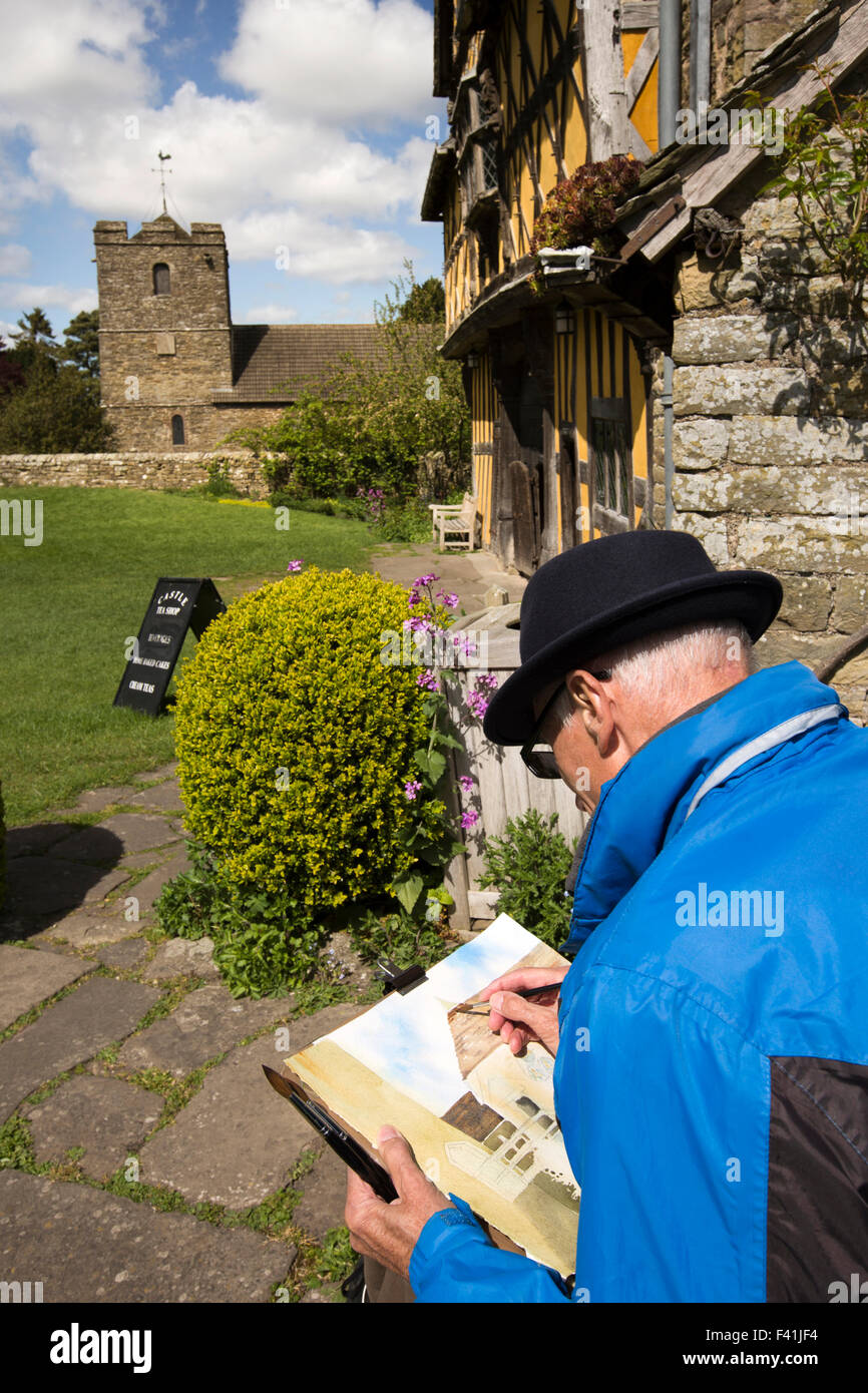 Regno Unito, Inghilterra, Shropshire, craven arms, Stokesay Castle, artista pittura acquerello di chiesa Foto Stock