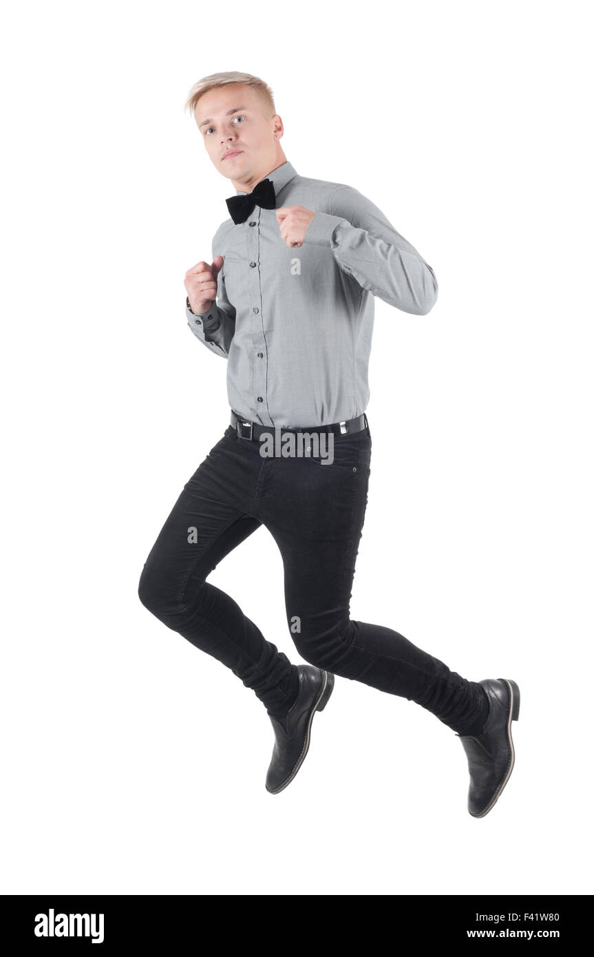 Bel Uomo in camicia e bow tie-jumping Foto Stock