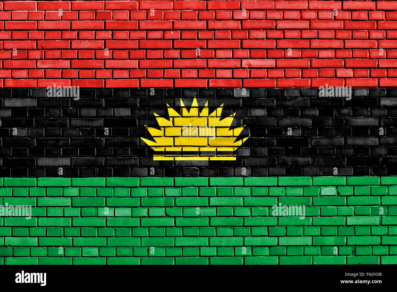 Bandiera del Biafra dipinta su un muro di mattoni Foto Stock