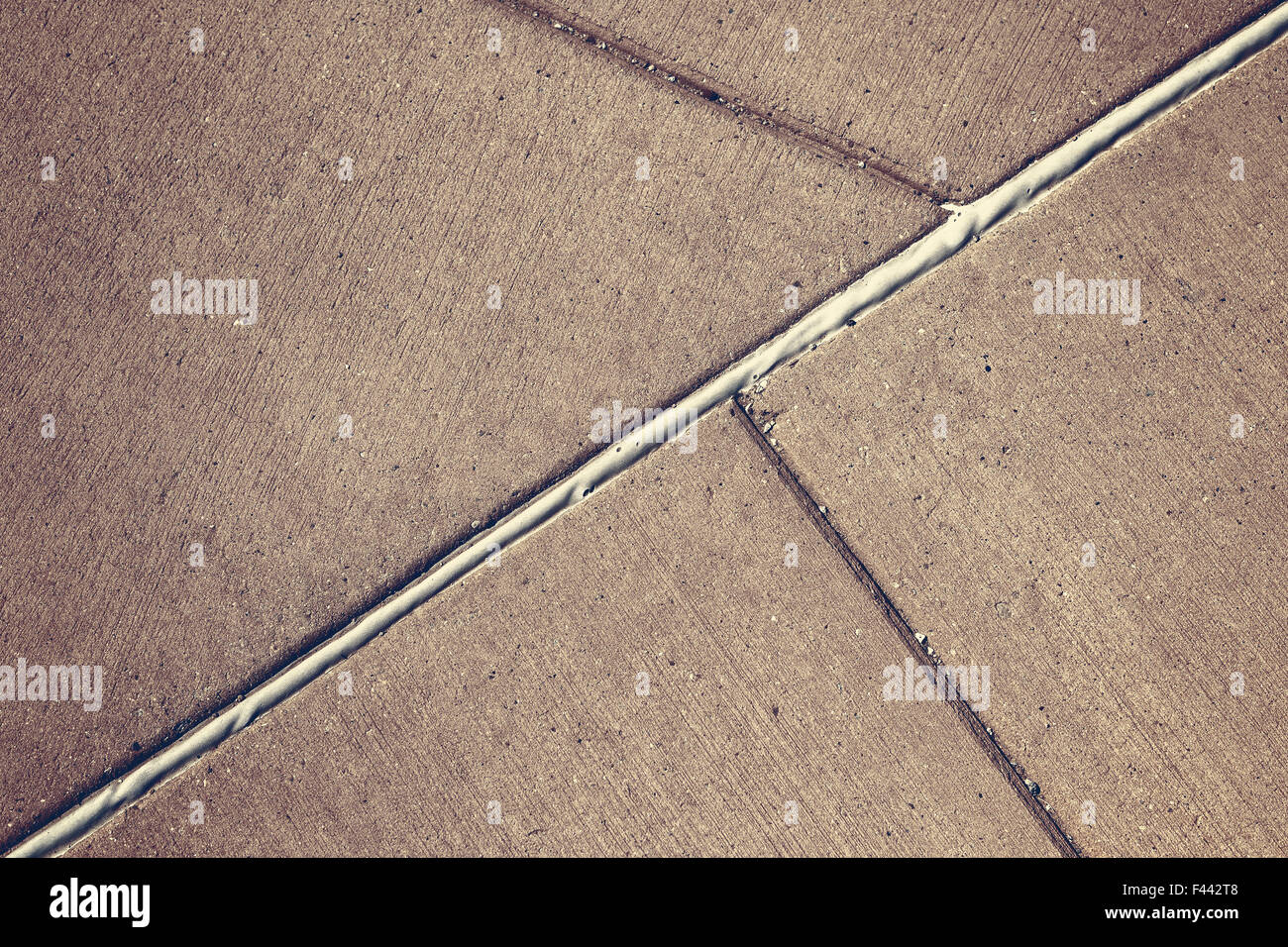 Sfondo costituito di pavimentazione in calcestruzzo con linee regolari. Foto Stock
