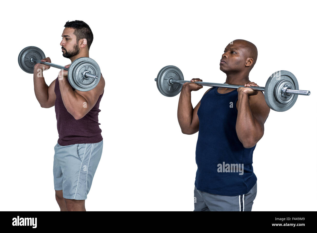 Due uomini muscolare il sollevamento barbell Foto Stock