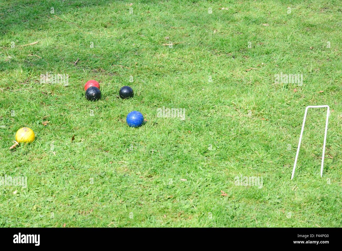 Croquet hoop con sfere Foto Stock