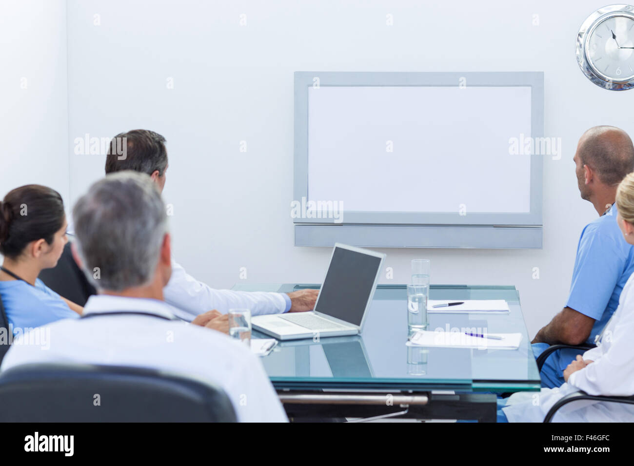 Team di medici aventi una riunione Foto Stock