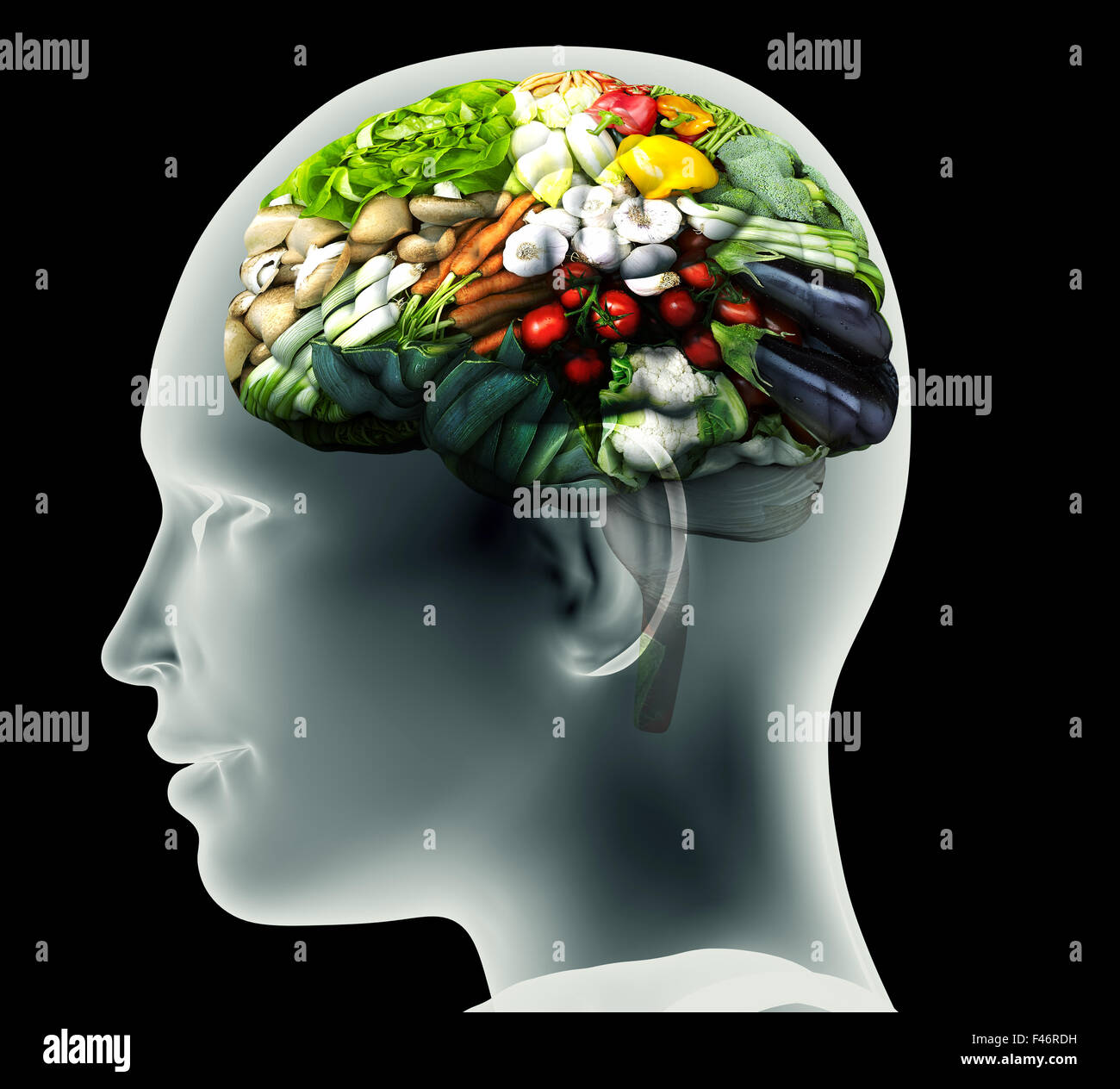 Immagine a raggi x della testa umana con le verdure per un cervello. Foto Stock