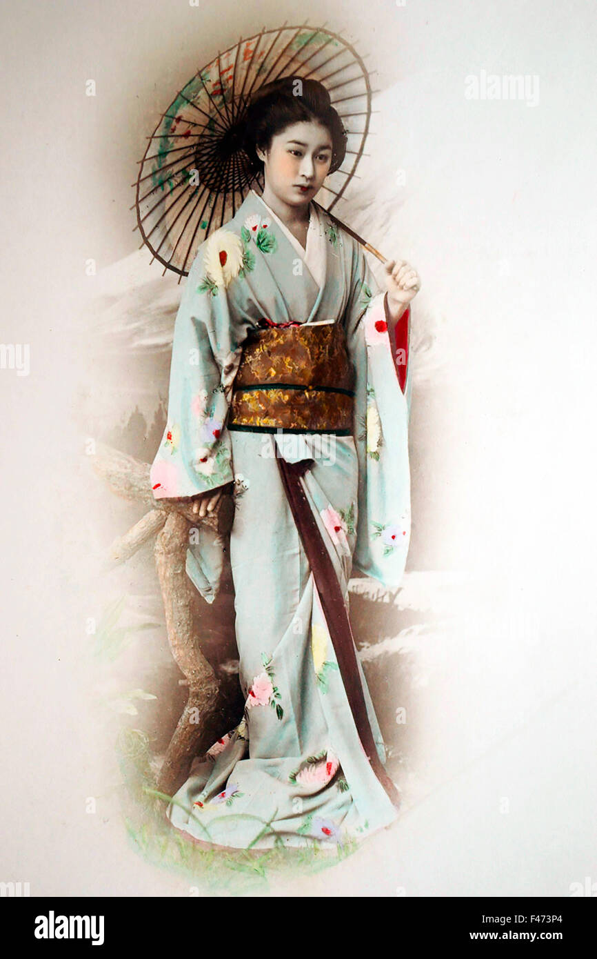 Geisha con ombrellone, Giappone Foto Stock