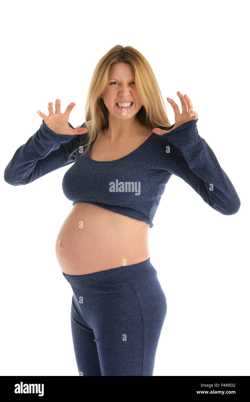 Arrabbiato donna incinta in un abito scuro Foto Stock