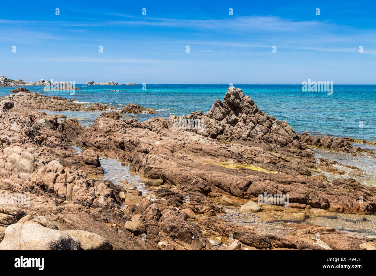Le rocce in spiaggia in Sardegna Foto Stock