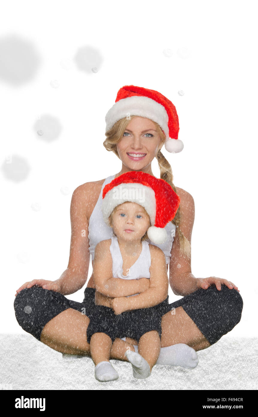 Famiglia abbigliamento per fitness e cappelli di Babbo Natale Foto Stock