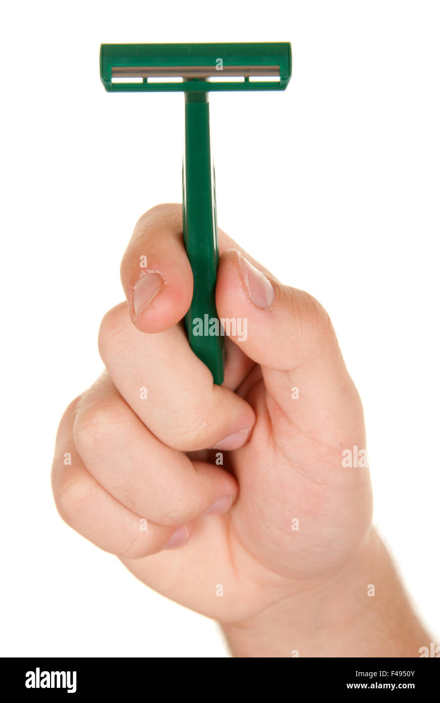 Mano impugna la macchina utensile per la rasatura Foto Stock