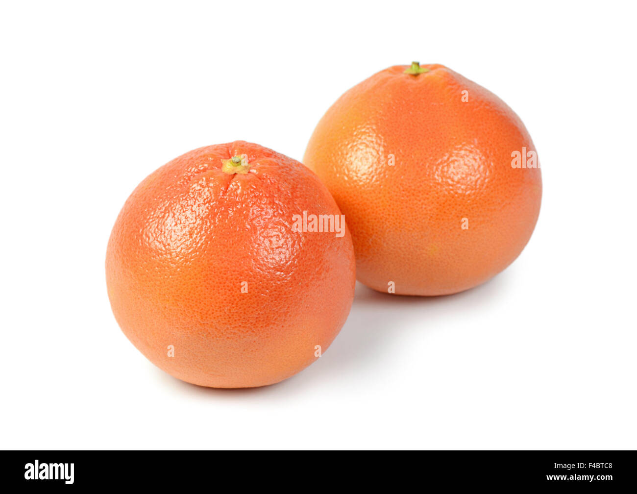 Luminose pompelmo isolati su sfondo bianco Foto Stock