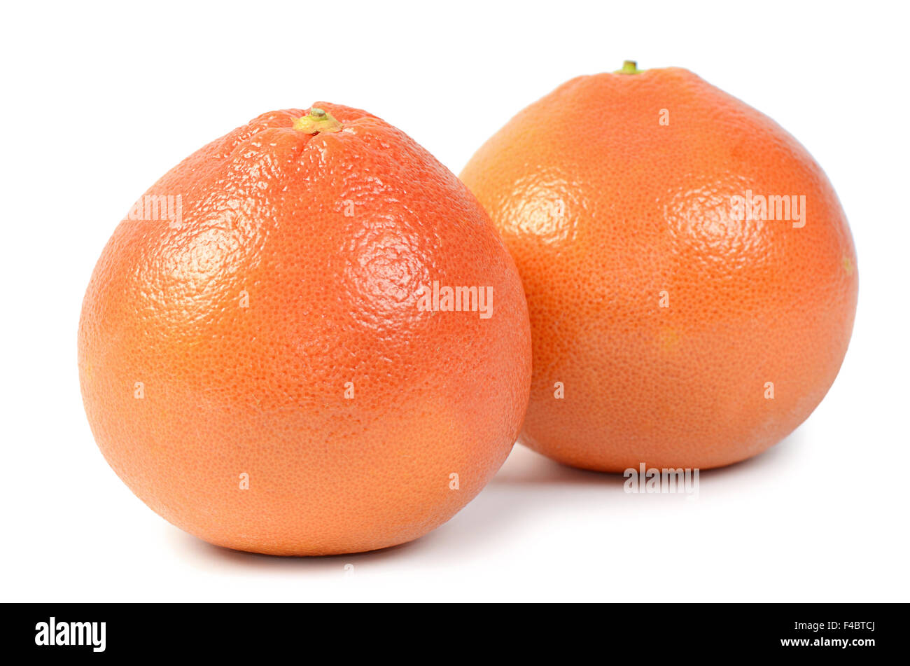 Luminose pompelmo isolati su sfondo bianco Foto Stock