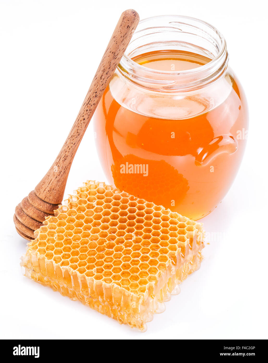 Vaso pieno di miele fresco e favi. Immagini di alta qualità. Foto Stock