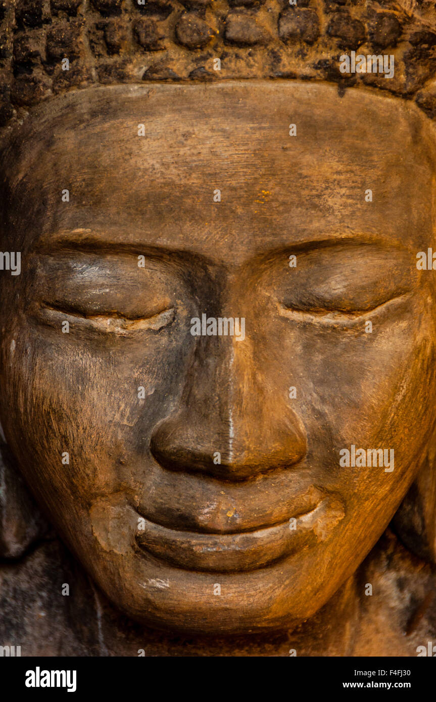 La faccia anteriore del Buddha di pietra Foto Stock