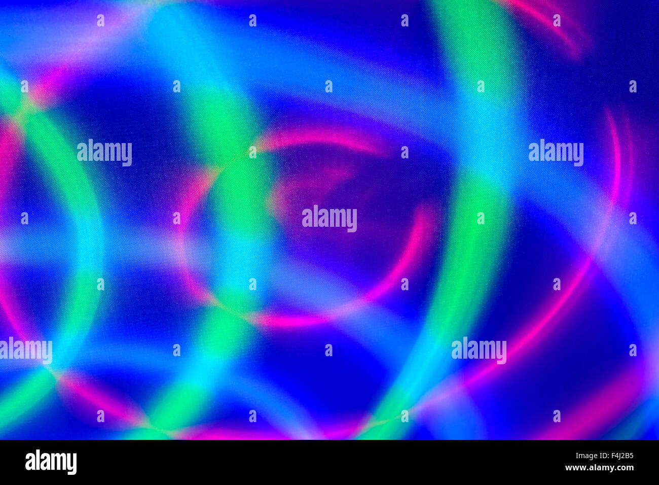 Sfondo astratto con luce tenue verde e rosso movimento di colore blu su tela di canapa Foto Stock