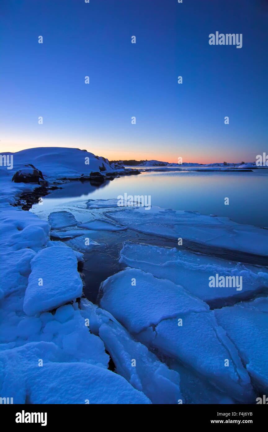 Alba sulla costa in inverno Foto Stock
