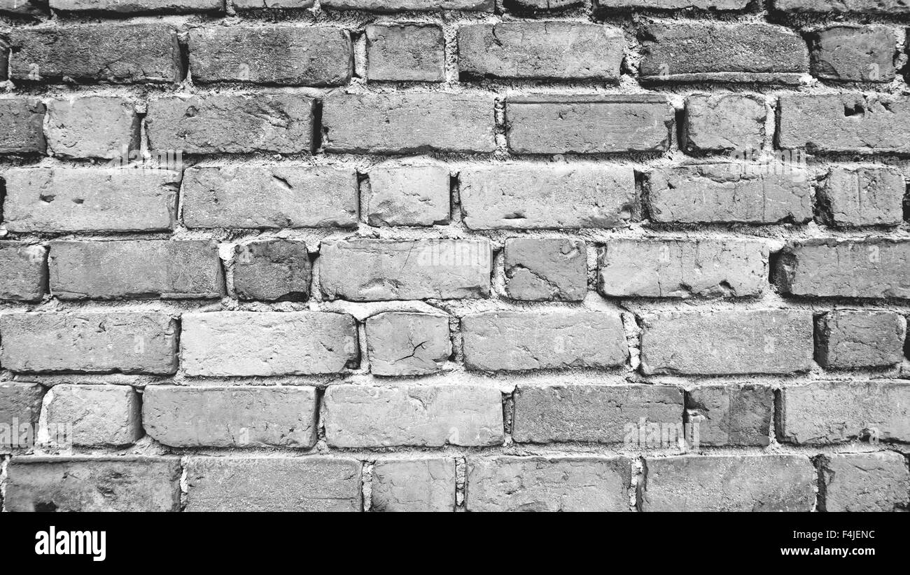 Scala di grigio di parete di mattoni orizzontali di sfondo Foto Stock