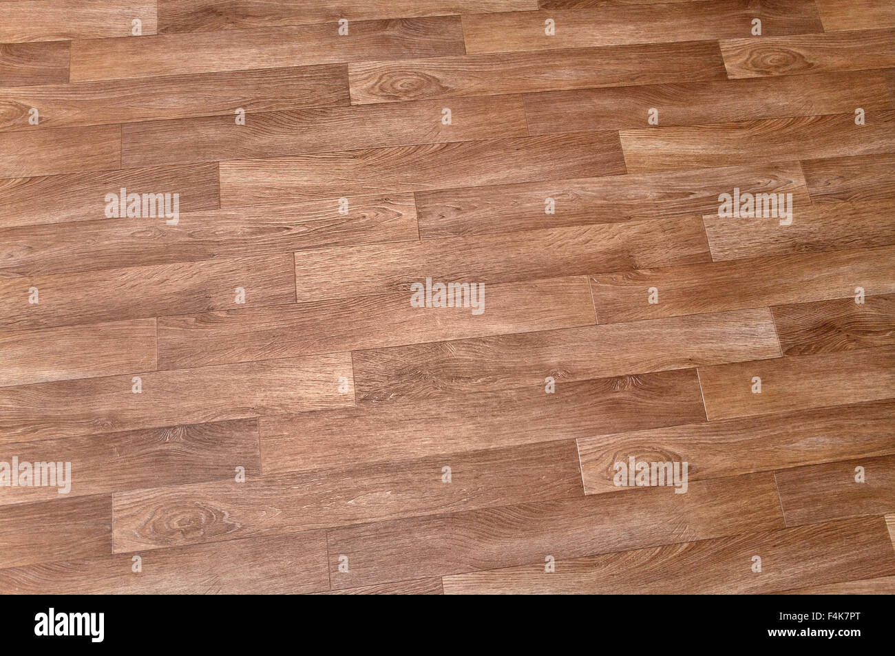 Close-up di nuovo linoleum con pattern di parquet, sfondo Foto Stock
