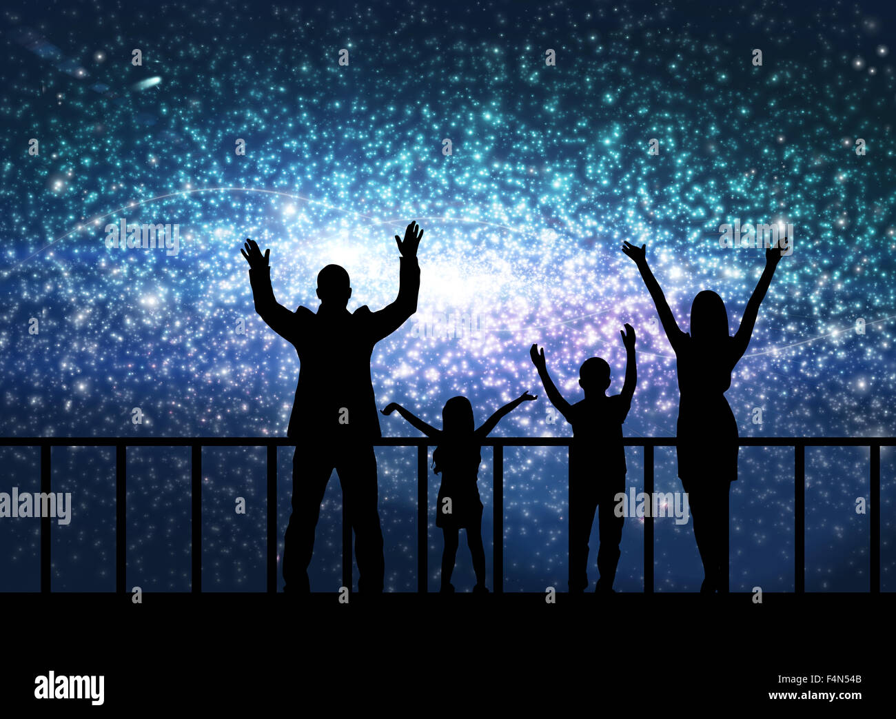 Silhouette di famiglia felice nel cosmo Foto Stock