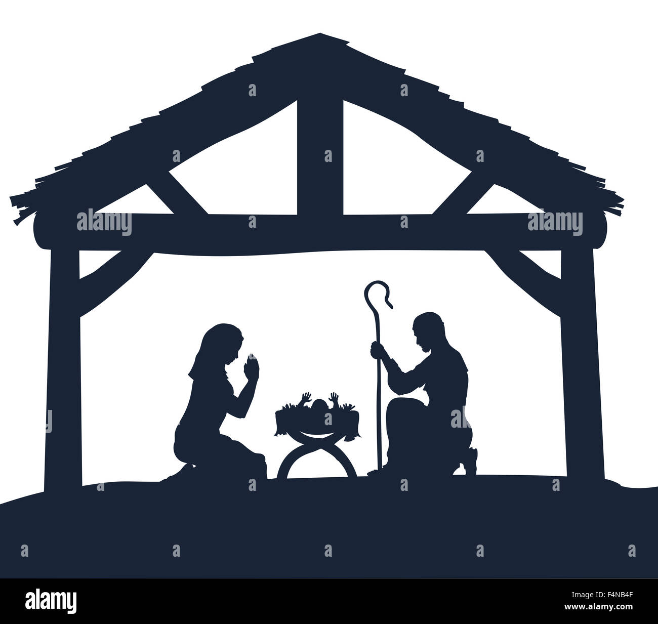 Tradizionale Presepe del Bambino Gesù nella mangiatoia con Maria e Giuseppe in silhouette Foto Stock