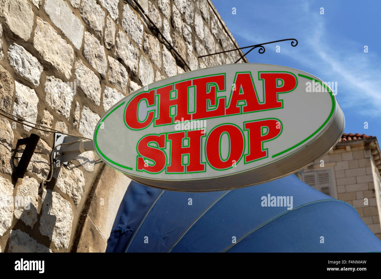 Segno del negozio a buon mercato Foto Stock